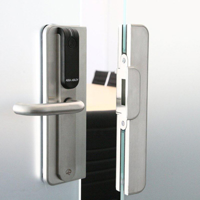 ASSA ABLOY - Aperio® Architectural glass solutions with Aperio™ escutcheons Electronic locking device Architectural glass solutions with Aperio® wireless lock technology from ASSA ABLOY